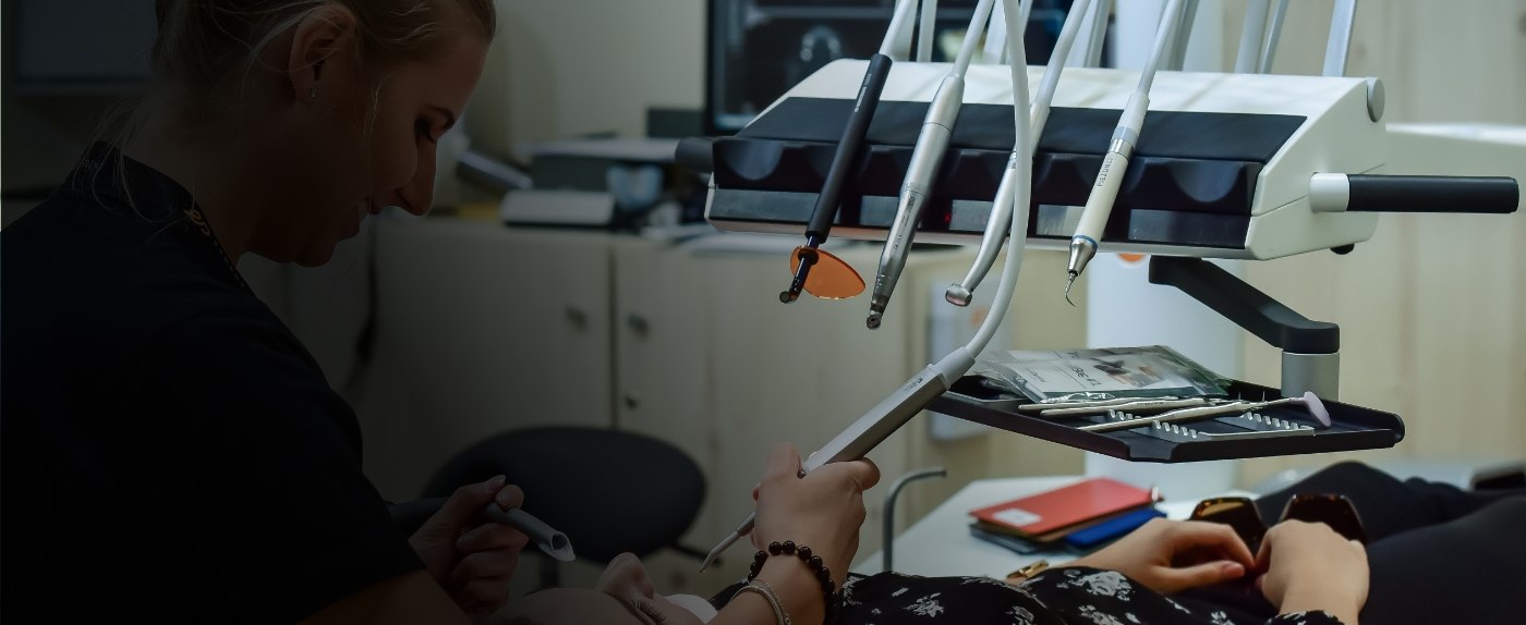 Cranford dental team member treating a periodontal patient