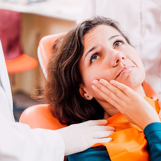 Woman at the dentist with a toothache